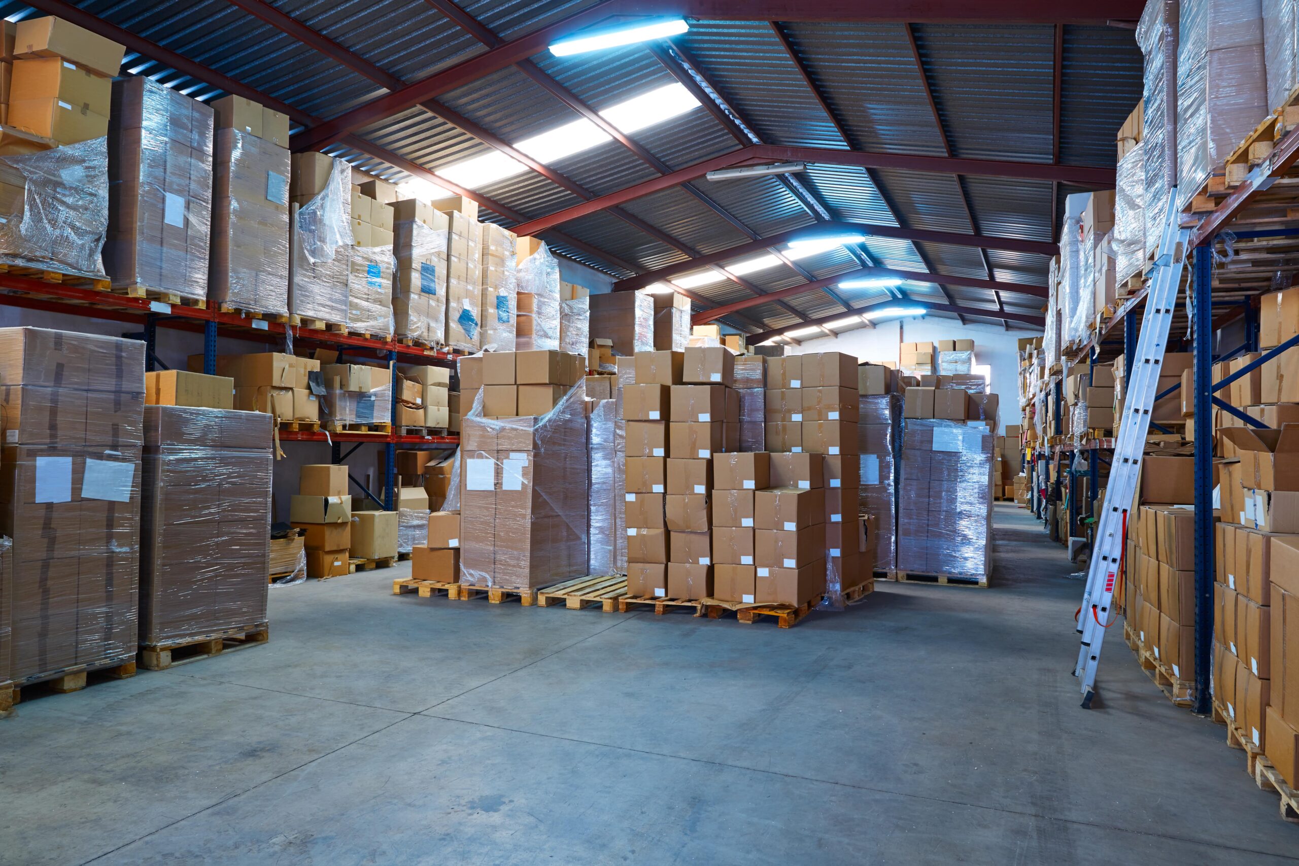 warehouse-stograge-with-stacked-boxes-rows-min
